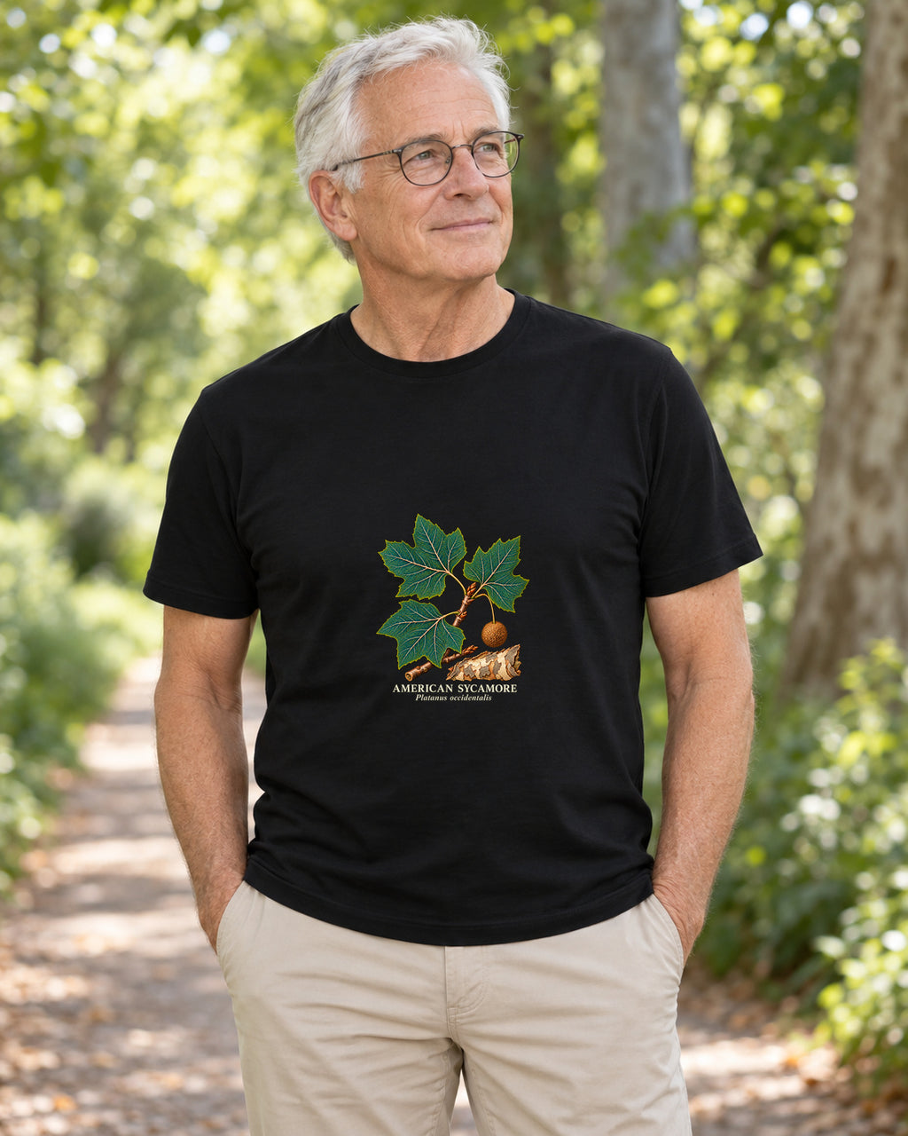 American Sycamore Botanical Study T-Shirt in black, shown in an illustrative lifestyle mockup.