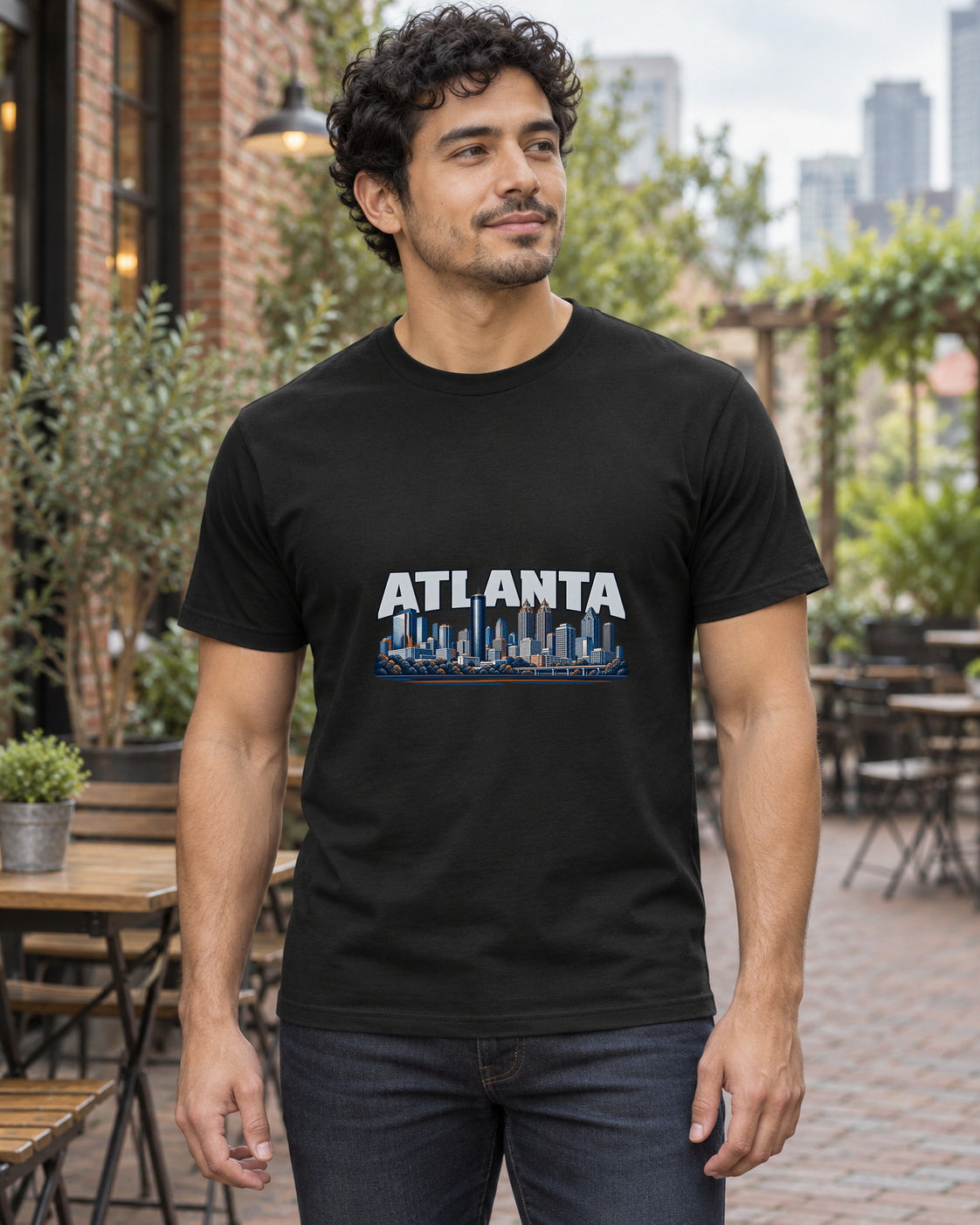 Atlanta City Skyline T-Shirt in black, shown in an illustrative lifestyle mockup.