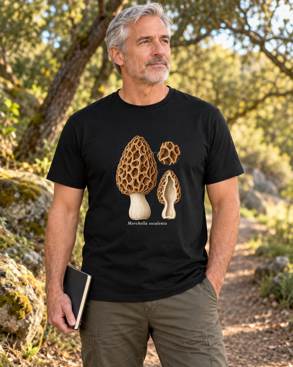 Common Morel Mushroom Study T-Shirt in black, shown in an illustrative lifestyle mockup.