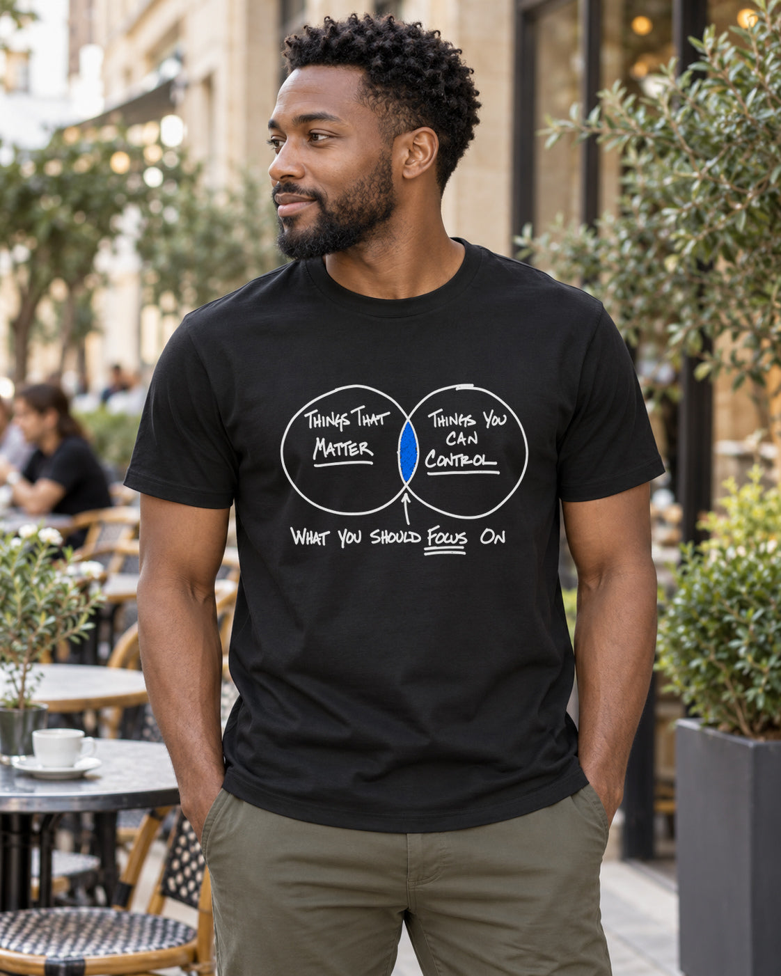 Illustrative lifestyle mockup of the focus white ink blue graphic T-shirt.