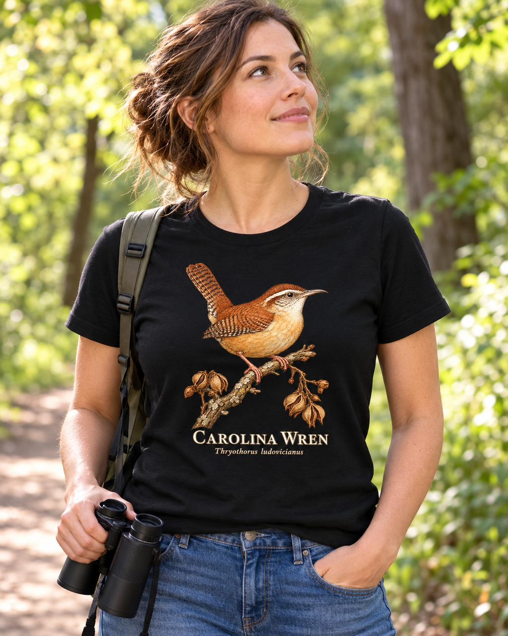 Lifestyle mockup of the Carolina Wren graphic T-shirt on a woodland birdwatching walk