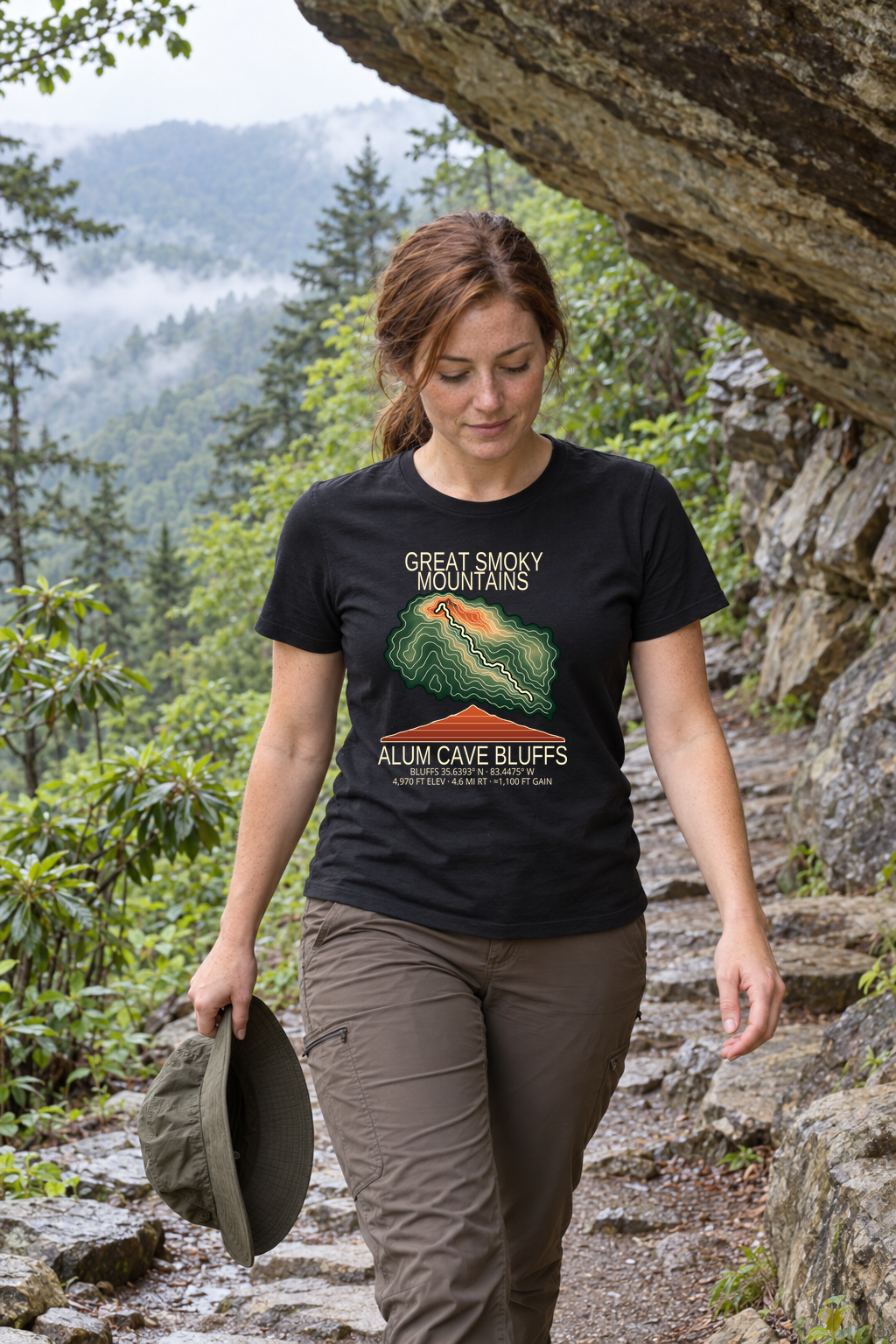Illustrative lifestyle mockup of Alum Cave Bluffs Hiking T-Shirt | Great Smoky Mountains on a black shirt in a generated outdoor scene.