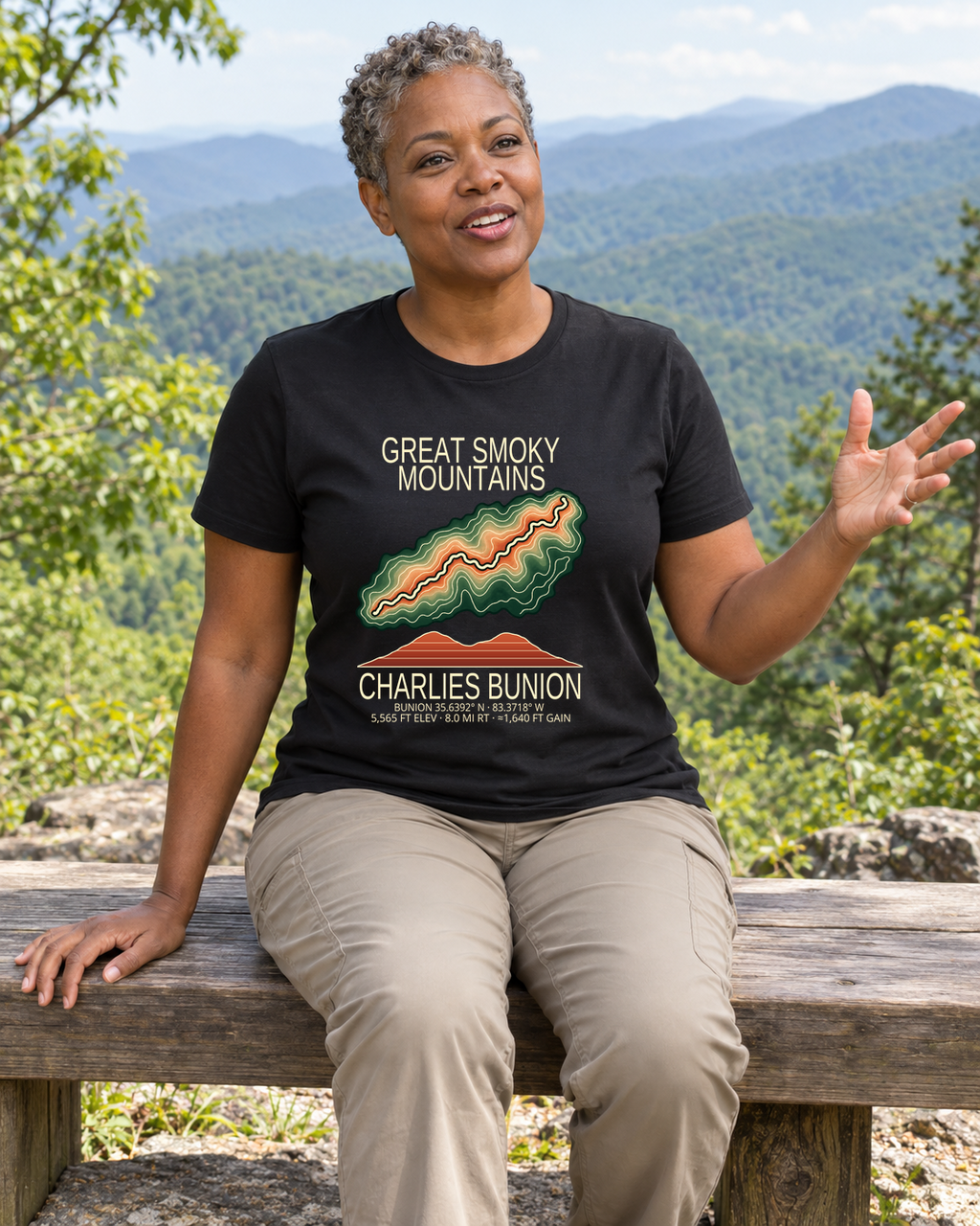 Illustrative lifestyle mockup of Charlies Bunion Hiking T-Shirt | Great Smoky Mountains on a black shirt in a generated outdoor scene.