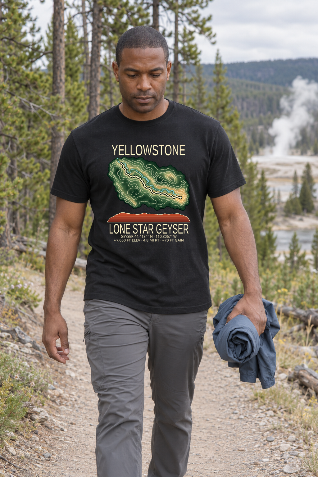 Illustrative lifestyle mockup of Lone Star Geyser Hiking T-Shirt | Yellowstone on a black shirt in a generated outdoor scene.