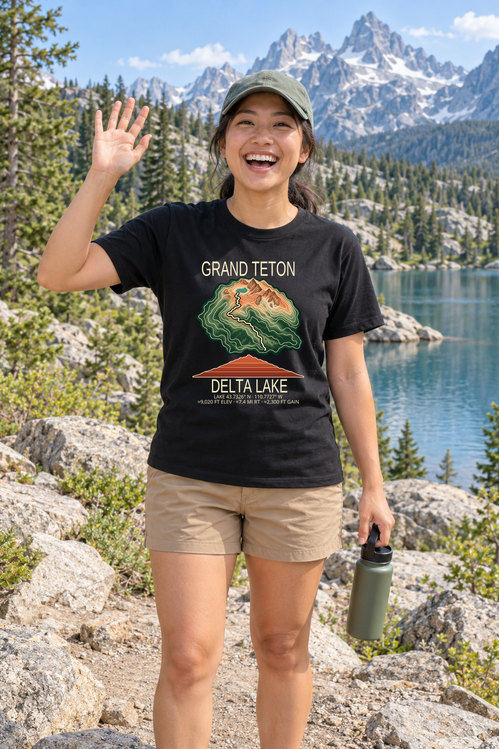 Illustrative lifestyle mockup of Delta Lake Hiking T-Shirt | Grand Teton on a black shirt in a generated outdoor scene.