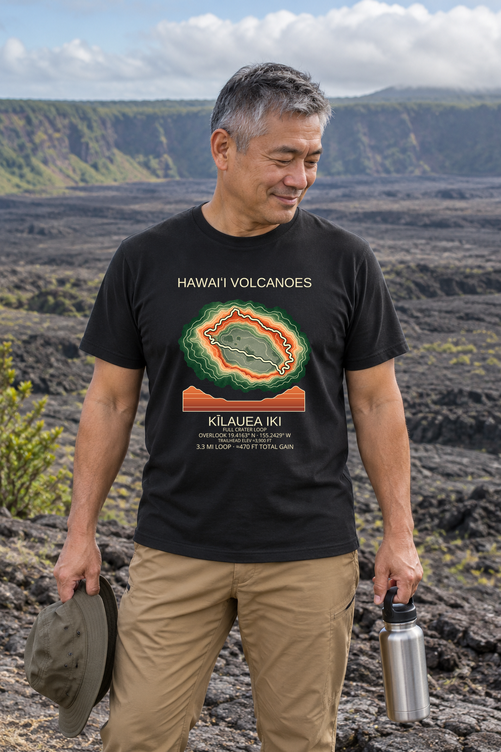 Illustrative lifestyle mockup of Kīlauea Iki Hiking T-Shirt | Hawaiʻi Volcanoes on a black shirt in a generated outdoor scene.