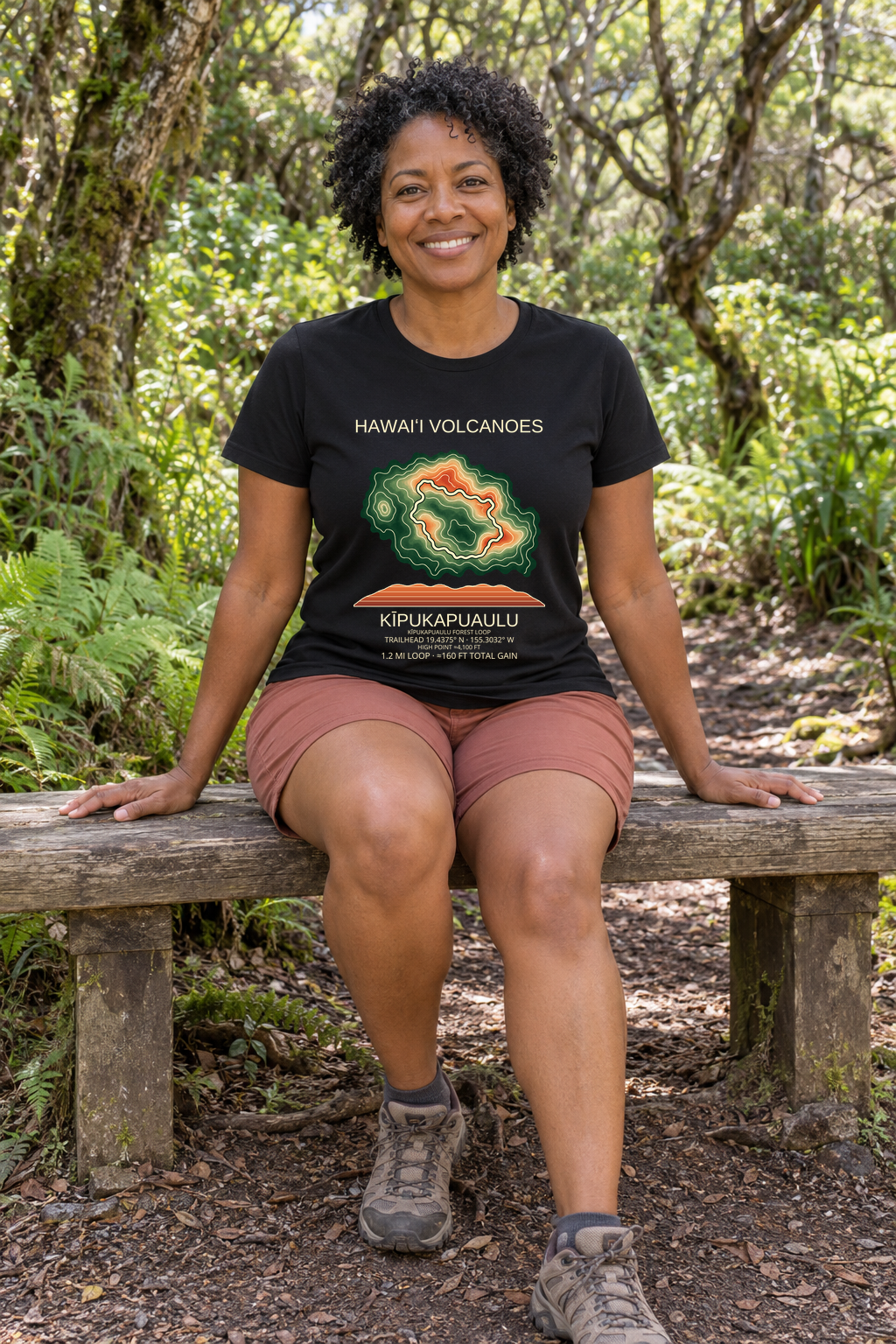 Illustrative lifestyle mockup of Kīpukapuaulu Hiking T-Shirt | Hawaiʻi Volcanoes on a black shirt in a generated outdoor scene.