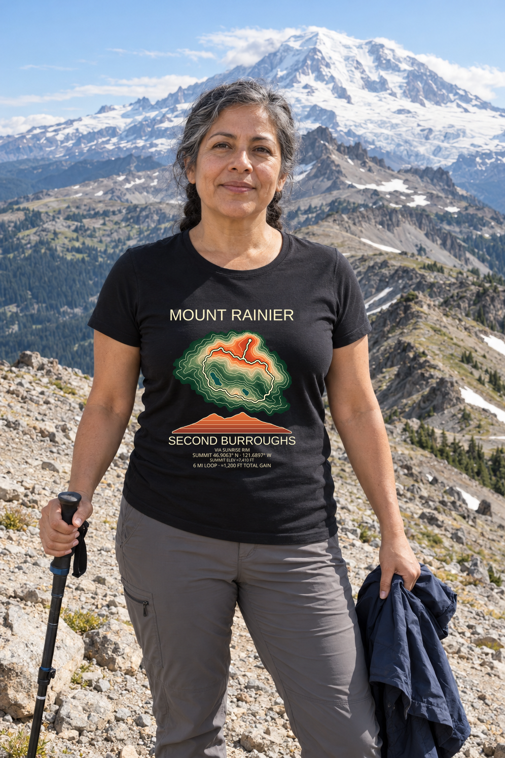 Illustrative lifestyle mockup of Second Burroughs Hiking T-Shirt | Mount Rainier on a black shirt in a generated outdoor scene.