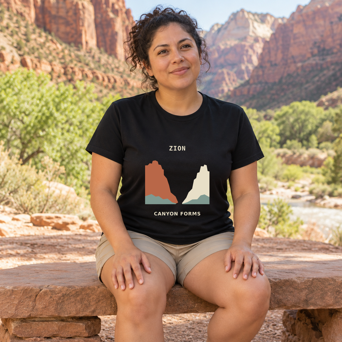 Illustrative lifestyle mockup of Zion Canyon Forms National Park T-Shirt on a black shirt in a generated outdoor scene.