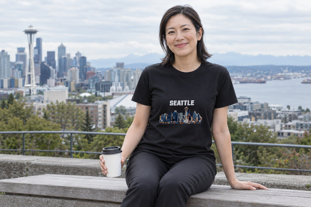 Illustrative lifestyle mockup of the Seattle Skyline Architecture T-Shirt on a black shirt in a generated scene.